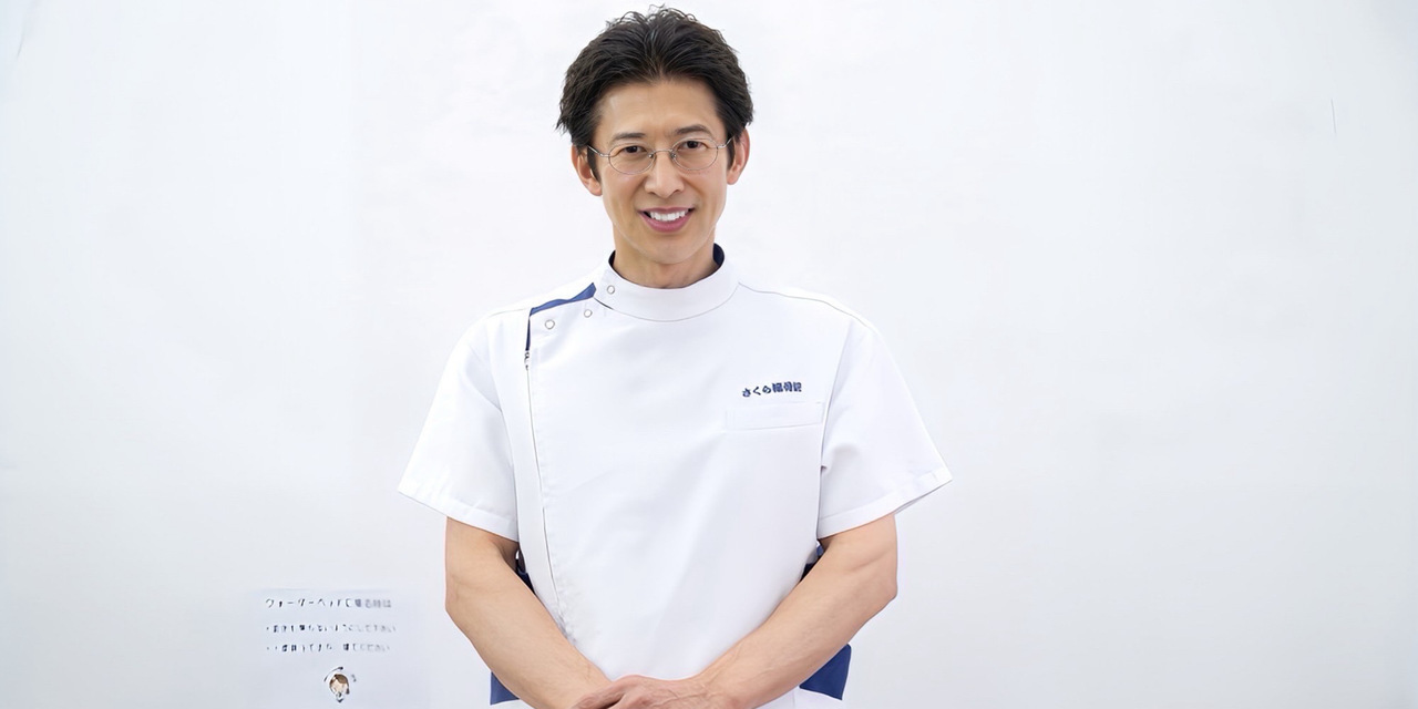 説明する柔道整復師